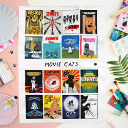 A white fabric print featuring a grid of 16 movie poster illustrations with the text 'MOVIE CATS'