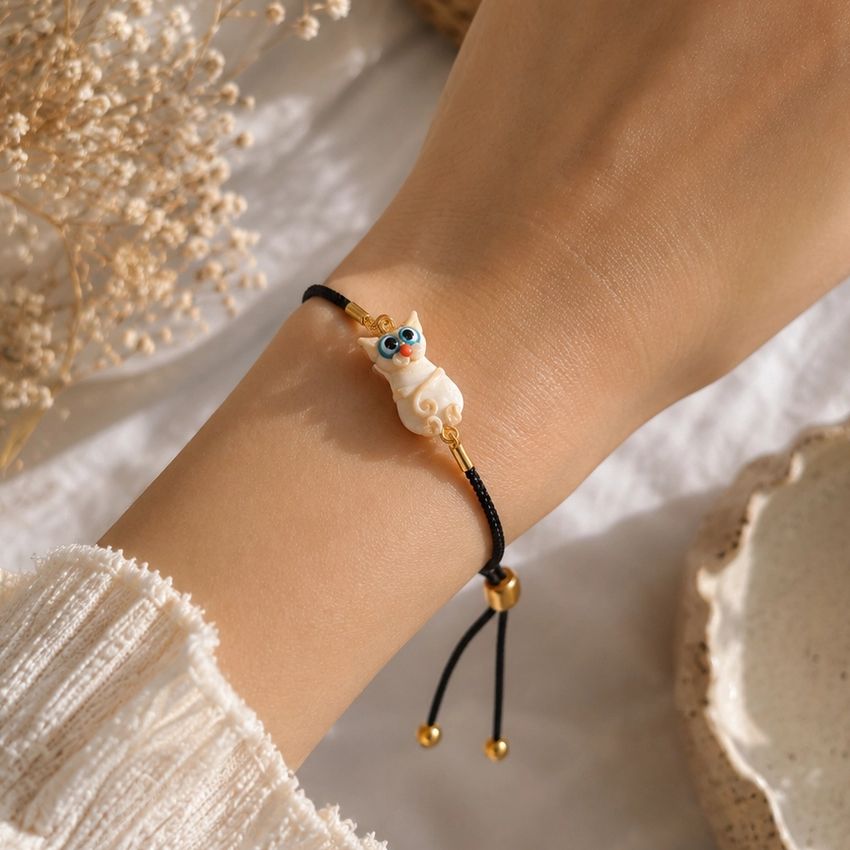 Artisan Glass Cream Cat Cord Bracelet