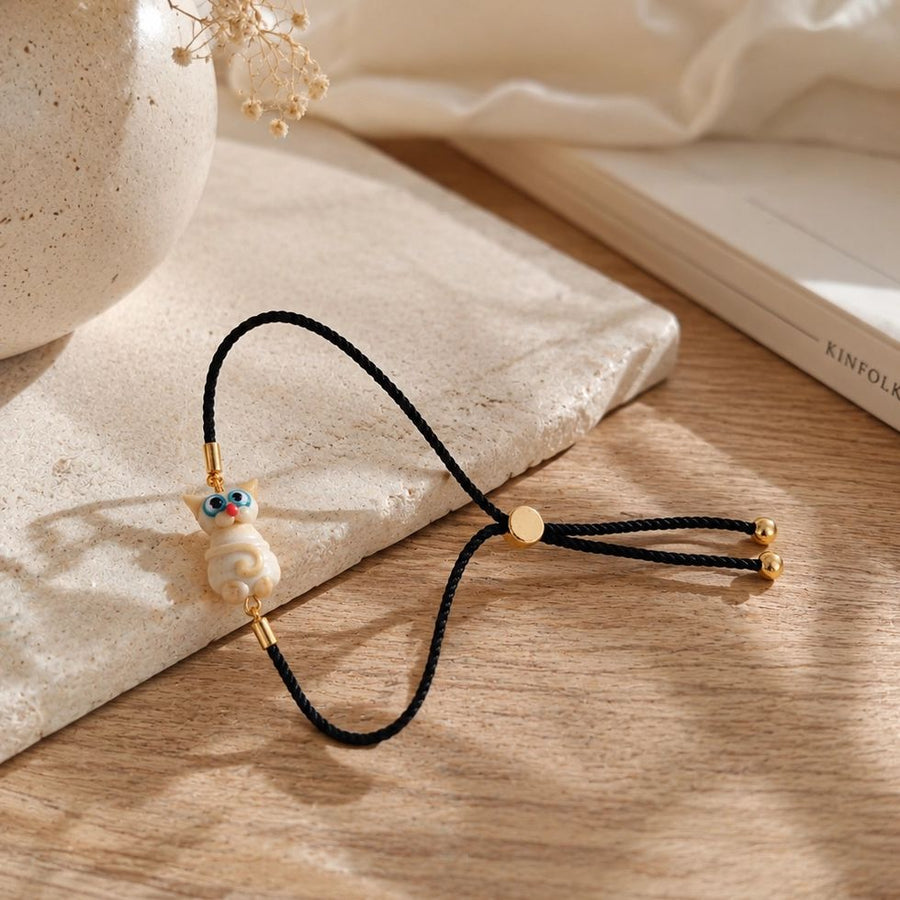 Artisan Glass Cream Cat Cord Bracelet