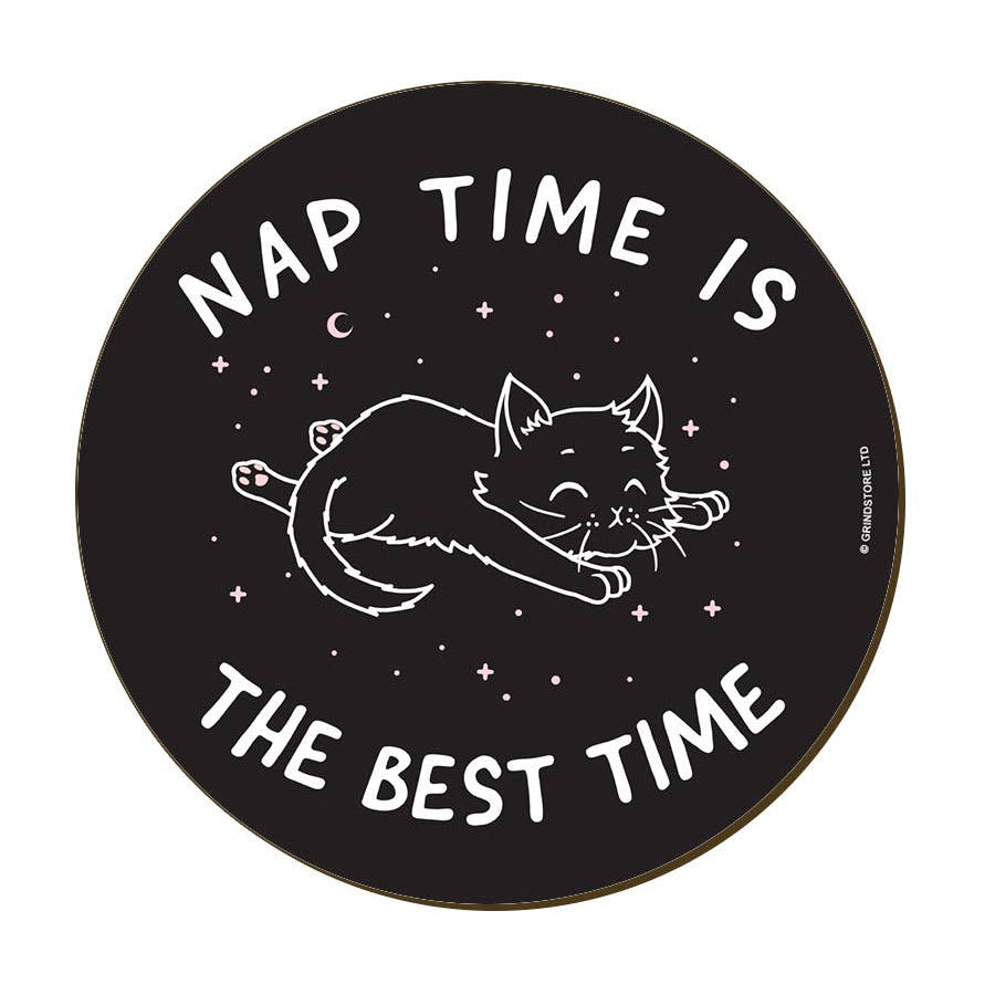 A round black coaster with a white line-art illustration of a sleeping cat, stars, and crescent moon, surrounded by the text 'NAP TIME IS THE BEST TIME'.