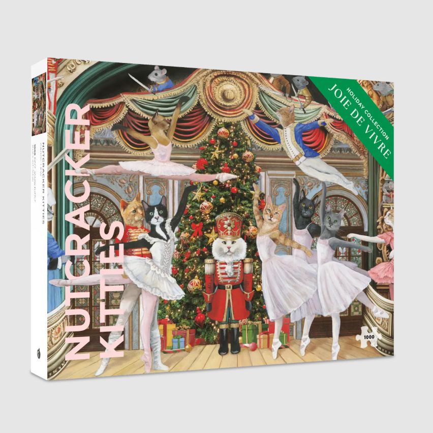 Jigsaw puzzle box featuring ballet dancing cats in a Nutcracker-themed setting with Christmas decorations.