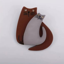 Cat-shaped Cat Brooch Pair on a white background