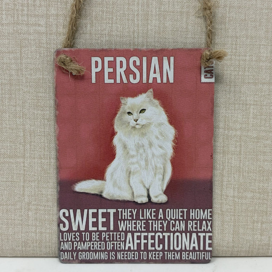 A rectangular hanging sign, featuring a photo of a fluffy white Persian cat on a muted red background with white text that reads 'PERSIAN' and additional cat-care wording.