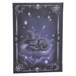 Decorative notebook with a cat in a witch hat under stars on a dark background