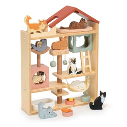 Wooden cat toy house with various cat-shaped toys, beds and scratching posts
