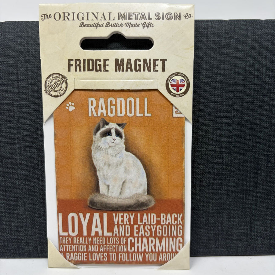 A packaged metal fridge magnet featuring an illustration of a fluffy Ragdoll cat. The card packaging reads 'The Original Metal Sign Co.
