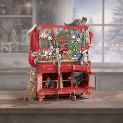 3D pop up card of Santa's Dresser, a red cabinet full of festive decor and several cats