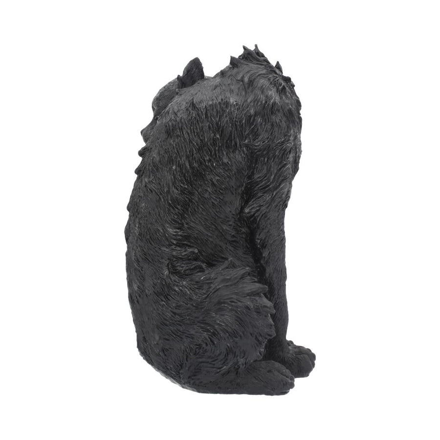 Side view of Spite Black Cat resin ornament on a white background