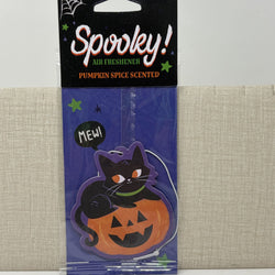 Spooky! Air Freshener pumpkin spice scented air freshener featuring a black cat in a jack-o'-lantern pot on a purple backing card.