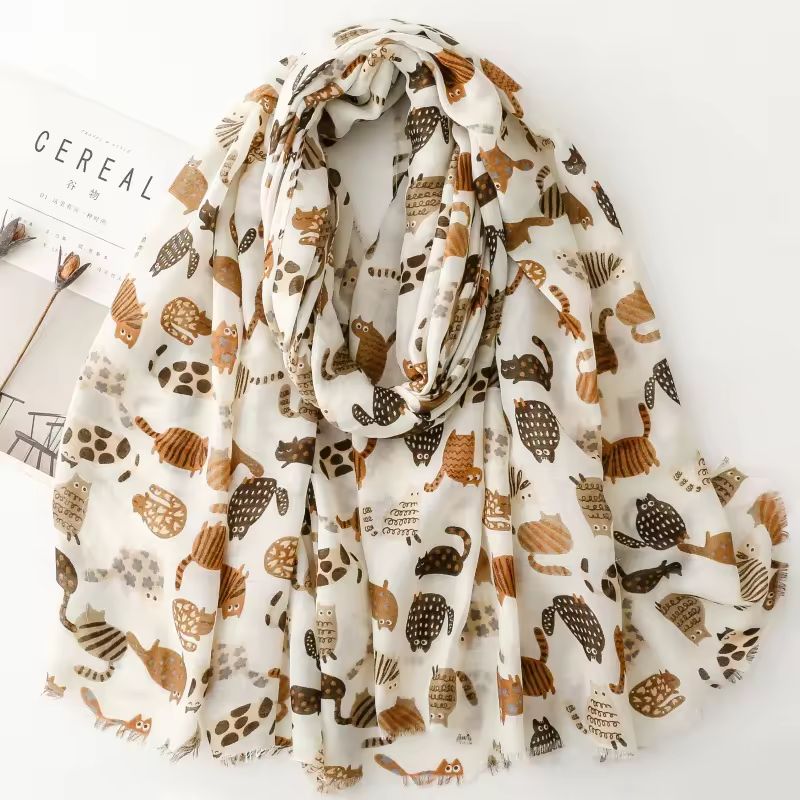 Lightweight Scarf in browns and cream with cat pattern on a white background