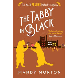 Book cover of 'The Tabby in Black' by Mandy Morton with two ginger cats and a cityscape illustration. No 2 Feline Detective Agency title