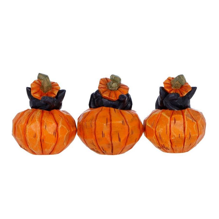 Three decorative pumpkins with black cats on a white background