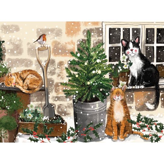 A placemat featuring a festive illustration of cats in potted plants, a wreath, and a shovel in a snowy scene.