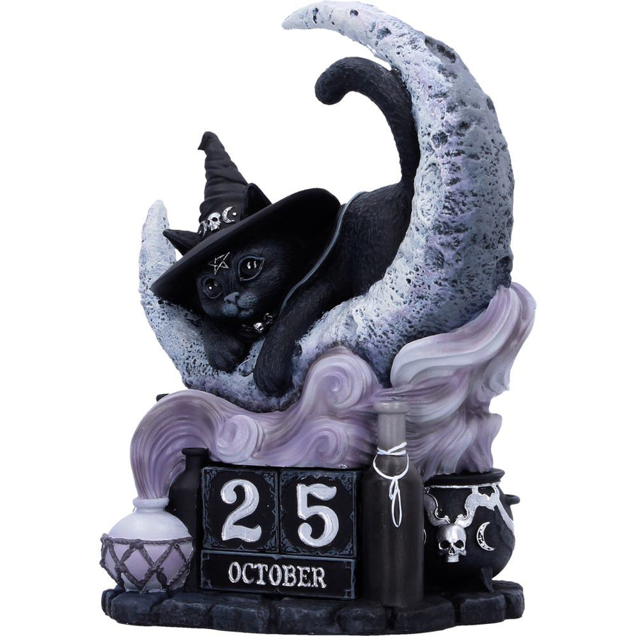 Decorative figurine of a cat in a witch hat on a moon with '25 October' text. The whole forming a perpetual calendar - front side view
