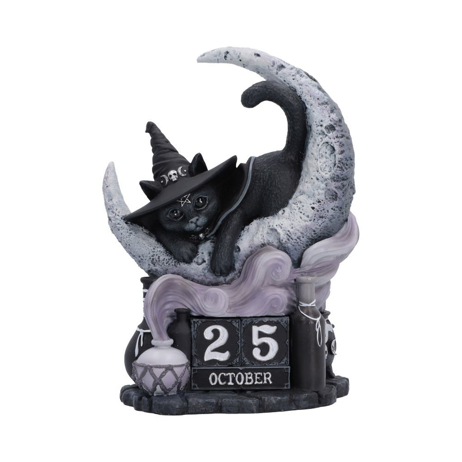Decorative figurine of a cat in a witch hat on a moon with '25 October' text. The whole forming a perpetual calendar.