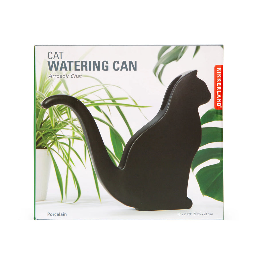 Box for Cat-shaped watering can on Kikkerland packaging with plants in the background