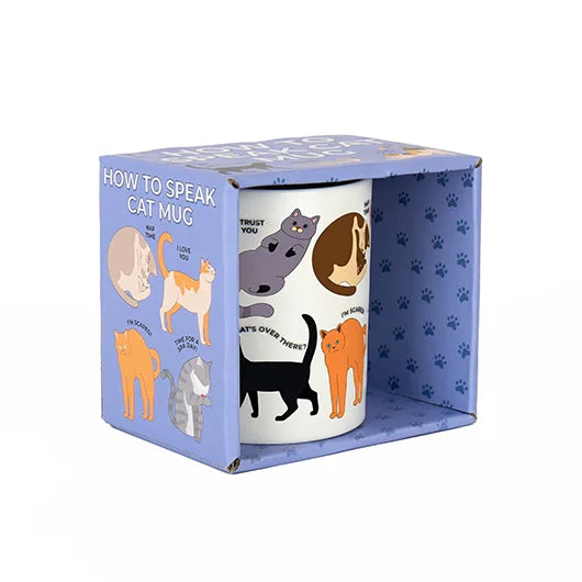 Ceramic mug with cartoon cats in various poses, each with a caption showing what the pose means, in an open fronted blue cardboard display case