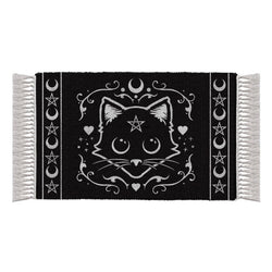 Black rug with white tassels with mystical white cat motif featuring pentagram stars and moons