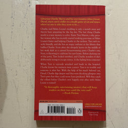 Back cover of Requiem for a Mouse by Miranda James, including a story teaser