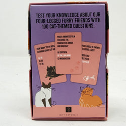 A boxed cat-themed trivia card game standing upright on a white surface. Reverse image showing text: 'TEST YOUR KNOWLEDGE ABOUT OUR FOUR-LEGGED FURRY FRIENDS WITH 100 CAT-Themed Questions.